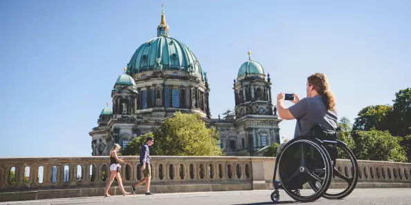 Blog Berlin Meetings, holding a meeting without barriers in Berlin, wheelchair users in front of the Berlin Cathedral